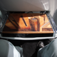 Illustration for article titled This $600K Rolls-Royce Has A City Carved Into Its Interior